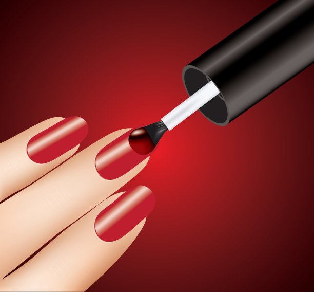 在手指上涂红色指甲油的女人图片下载