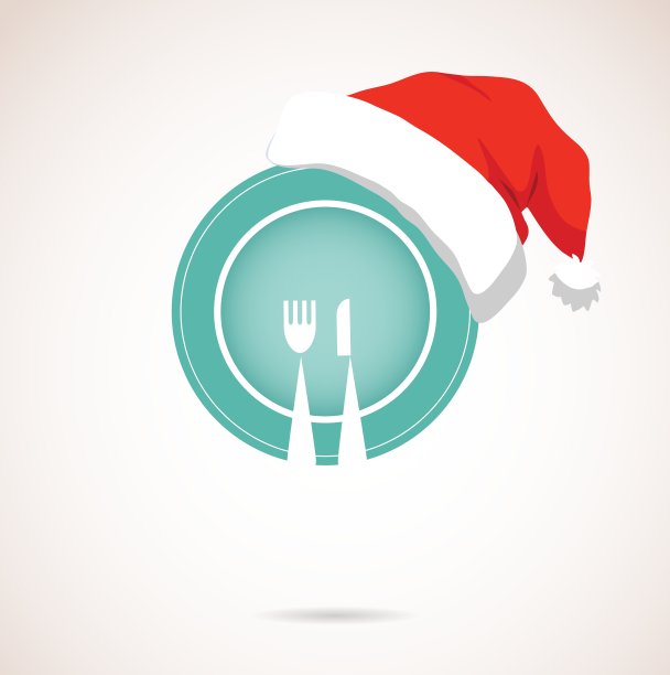 圣诞晚餐盘子上戴着圣诞红帽子图片下载
