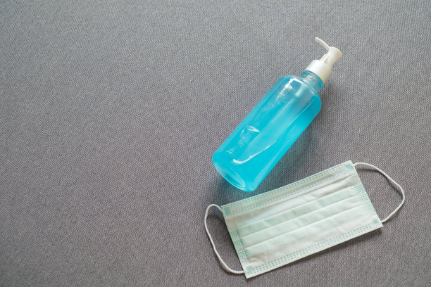 带口罩洗手用的酒精水瓶、清洁冠状病毒的甘油、Covid - 19图片下载