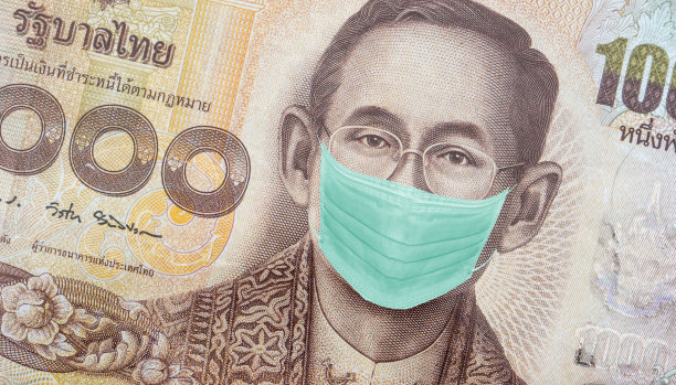 泰国纸币特写：普密蓬·阿杜德国王肖像，戴白色口罩图片下载
