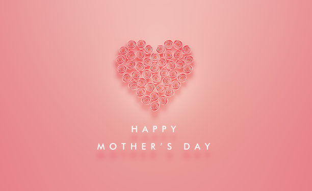 粉色玫瑰做的心旁边粉红色背景上的母亲节快乐信息图片下载