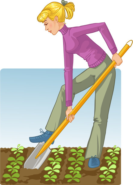年轻女子正在用铁锹挖春土图片下载