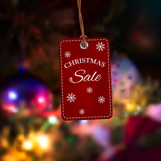 圣诞销售标签模糊背景上的标签图片下载