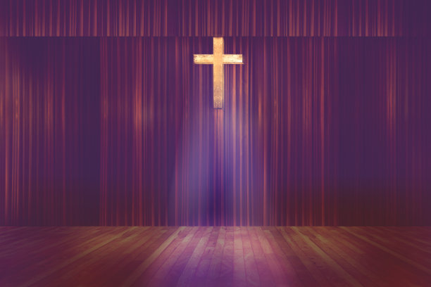 小教堂红窗帘背景上的木制十字架图片下载