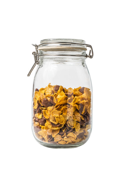 麦片在瓶玻璃隔离包括剪辑路径在白色的背景。堆栈的形象图片下载