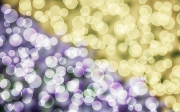 一个美丽的自然图像与圆形的光流动的效果在花的背景图片下载