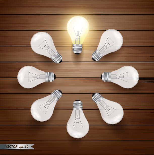 木制背景上发光的灯泡图片下载