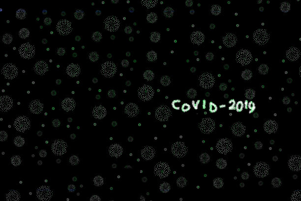 背景与题词COVID-19黑色与抽象病毒株模型图片下载