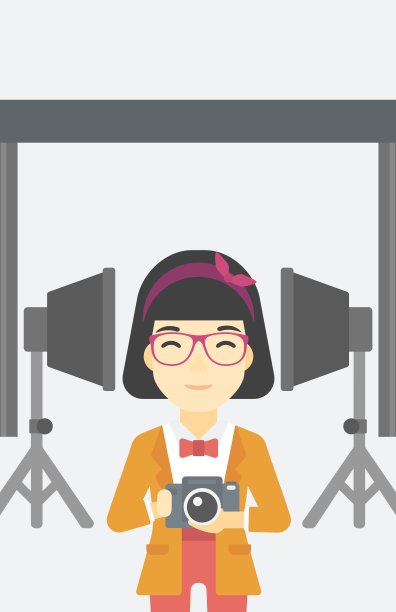 微笑的摄影师拿着相机图片下载