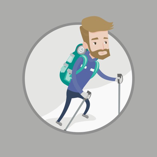 年轻的登山运动员正在攀登积雪的山脊图片下载