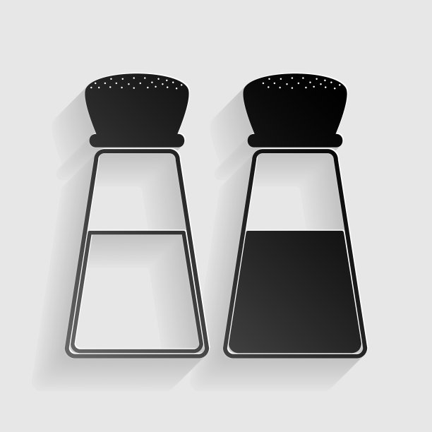 盐和胡椒签名黑纸上有阴影图片下载