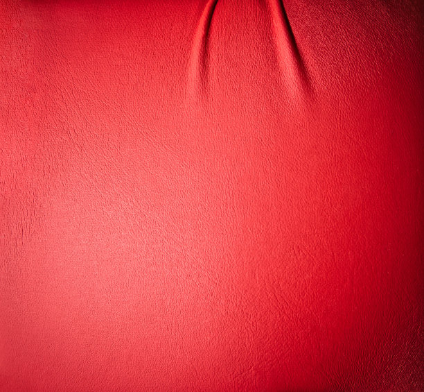 红色人造皮革纹理。图片下载