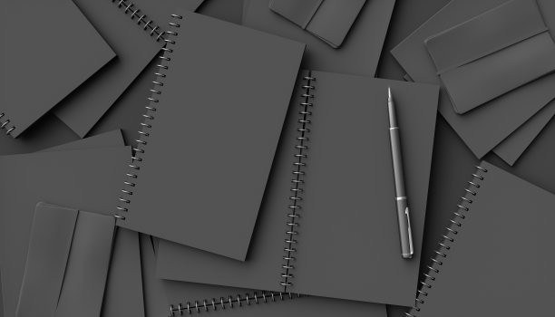 黑色背景上的黑色笔记本图片下载