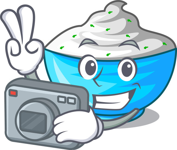 摄影师在角色碗里的酸奶油图片下载