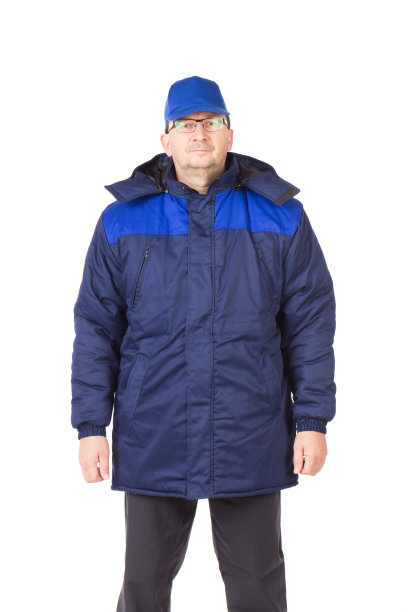 工人穿着蓝色的夹克和帽子。图片下载