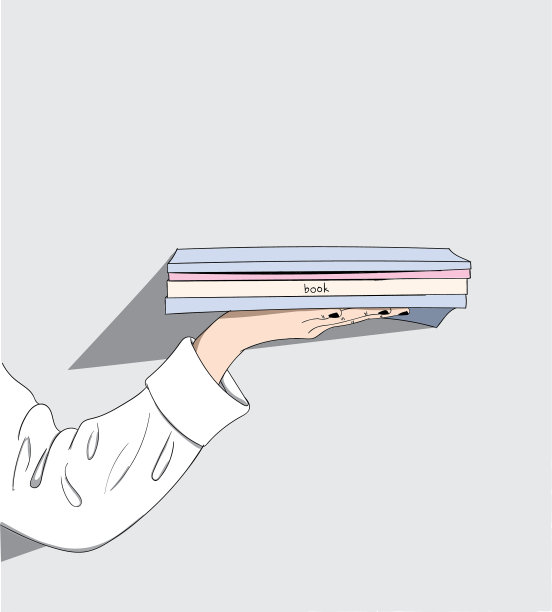 这个女人拿着许多她喜欢的书图片下载