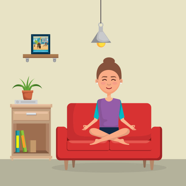 年轻女子在沙发上练习瑜伽图片下载