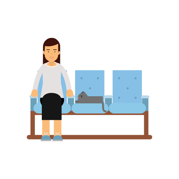 一个年轻女人和她的猫坐在候诊室里图片下载