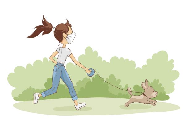 在隔离区遛狗。素材图片