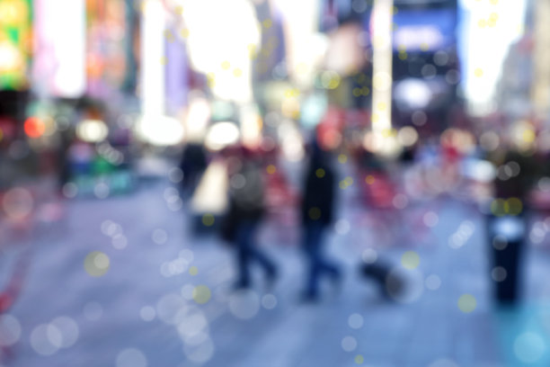 模糊抽象的背景图像的人在城市街道上图片下载