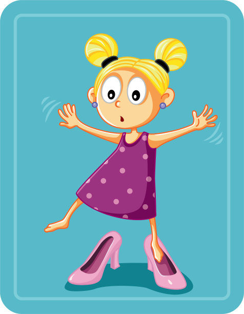 小女孩在试穿妈妈的高跟鞋图片下载