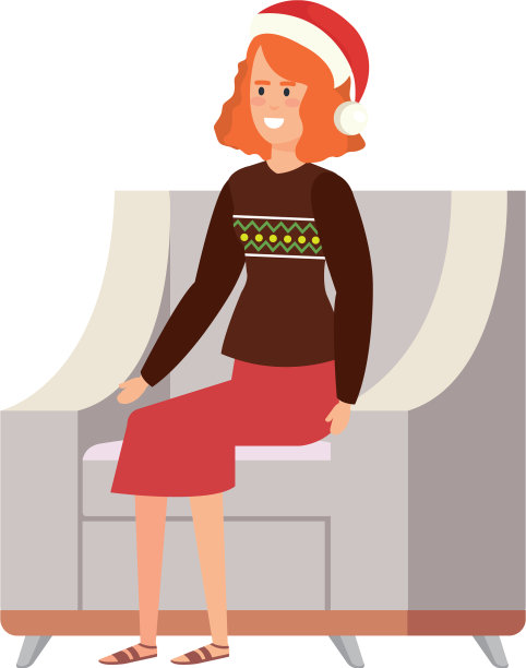 穿着圣诞衣服坐在沙发上的女人图片下载