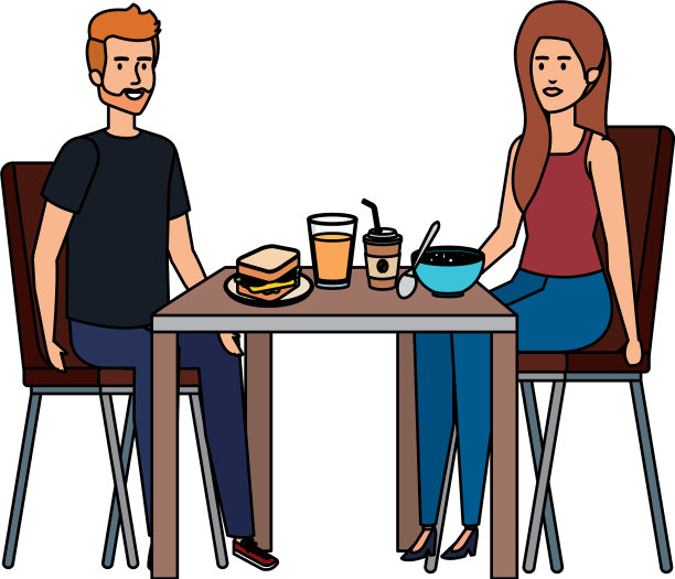 年轻夫妇在餐桌上吃饭图片下载