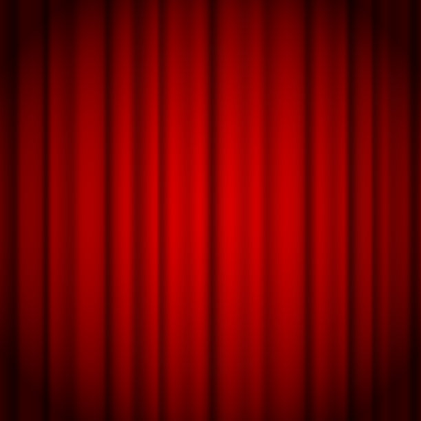 红色的窗帘背景被一束光照亮图片下载