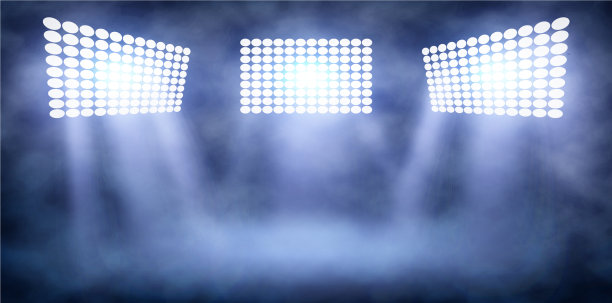 灯光塔在夜间体育场的烟雾图片下载