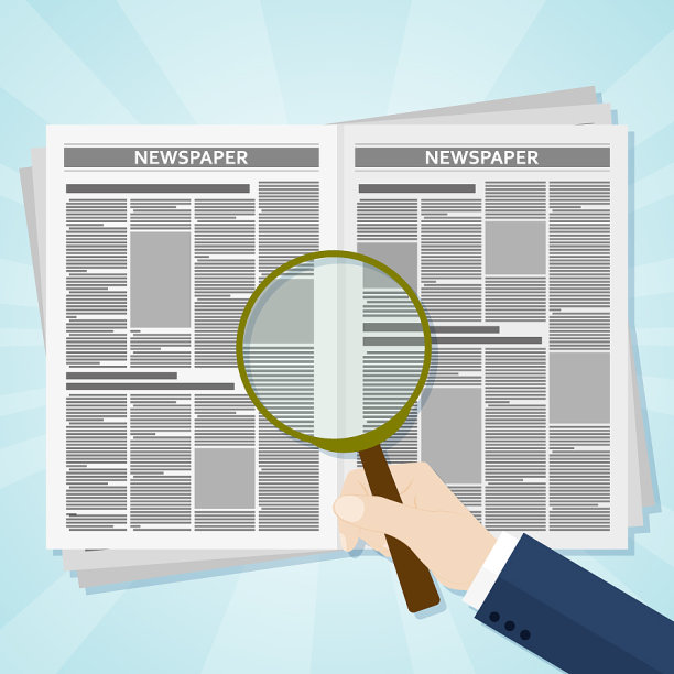 拿着放大镜看商业新闻图片下载