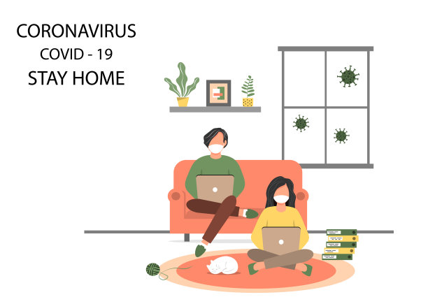 在家注意安全。一男一女在家里工作，以减少感染风险和防止Covid-19病毒的传播。新冠肺炎疫情期间居家隔离。素材图片