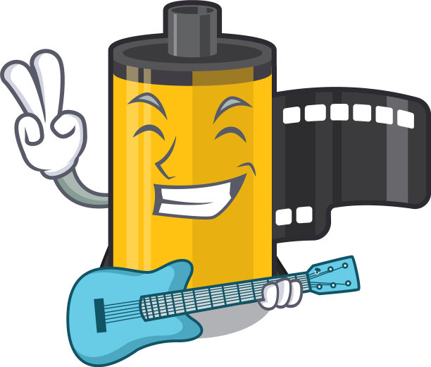 用吉他相机卷在木制卡通桌子上面图片下载