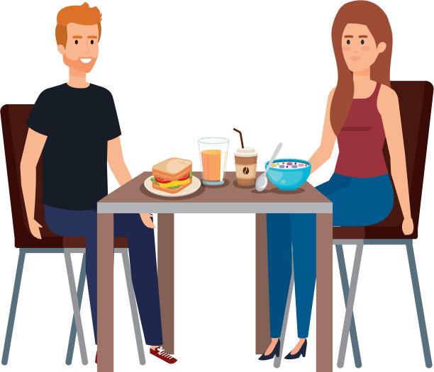年轻夫妇在餐桌上吃饭图片下载