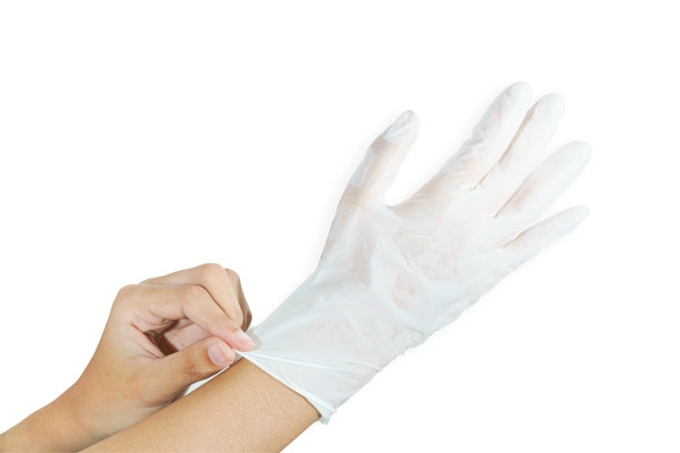 女人双手戴着橡胶手套保护安全covid 19白色背景图片下载