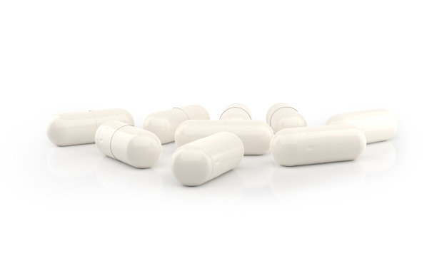 白色胶囊孤立在白色背景上。补充胶囊。3 d渲染。图片下载