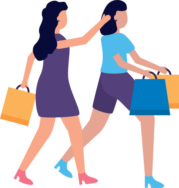 两个女人拿着购物袋图片下载