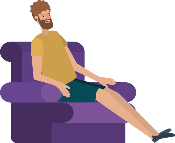 一个留着胡子的年轻人坐在沙发上图片下载