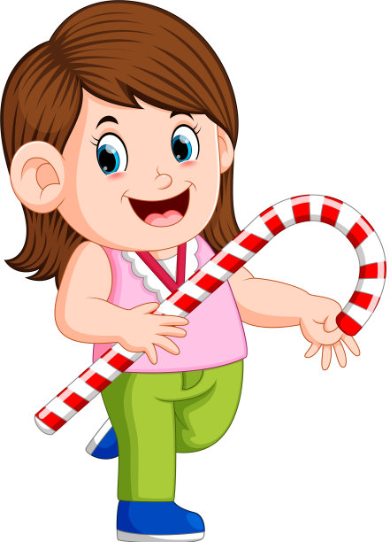 一个女孩拿着一个大的圣诞糖果手杖图片下载