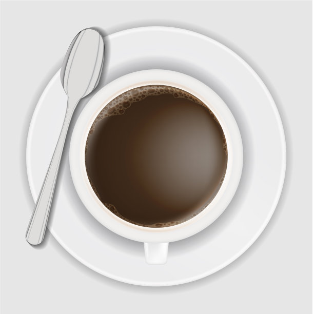 俯视图咖啡杯和勺子在盘子上图片下载