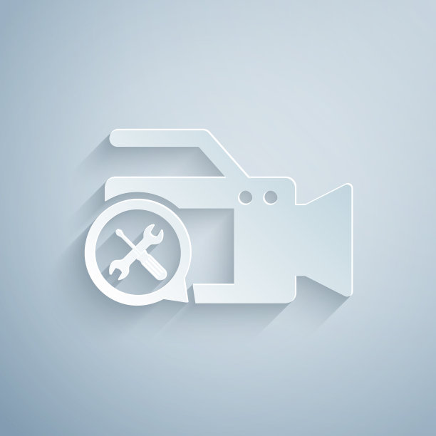 剪纸摄像机与螺丝刀和扳手图片下载