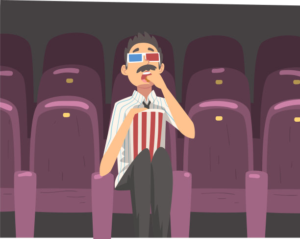 戴着3d眼镜的年轻人坐在电影院图片下载