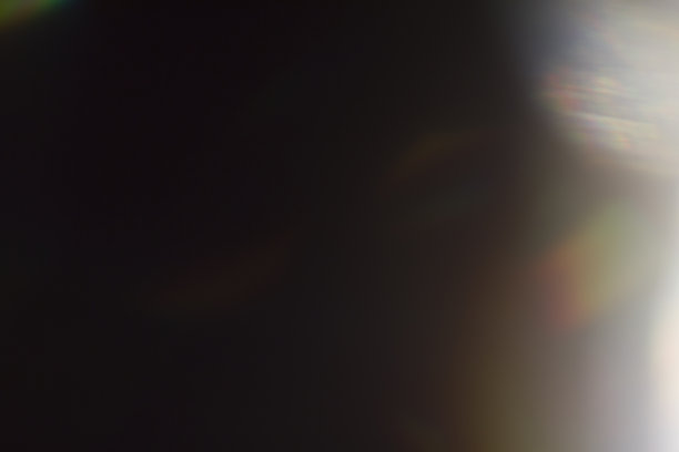 在黑色背景上漏光图片下载