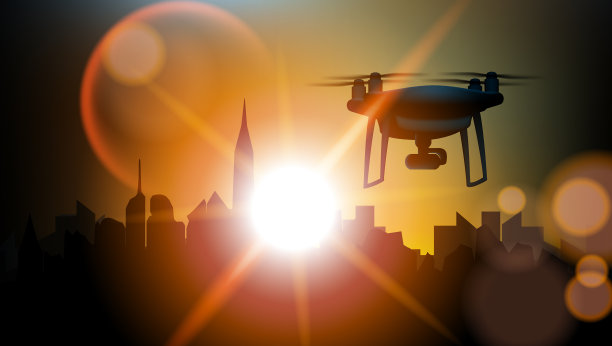 四架无人机在城市上空盘旋图片下载