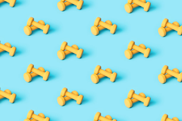 用黄色哑铃做成的图案。图片下载