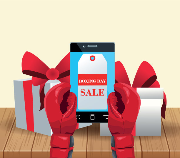 手持手机和礼品盒的拳击手套图片下载