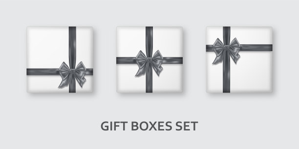 白色的礼盒，上面有银色的丝带和蝴蝶结图片下载