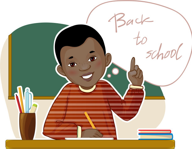 快乐的非裔美国小男孩在书桌前图片下载