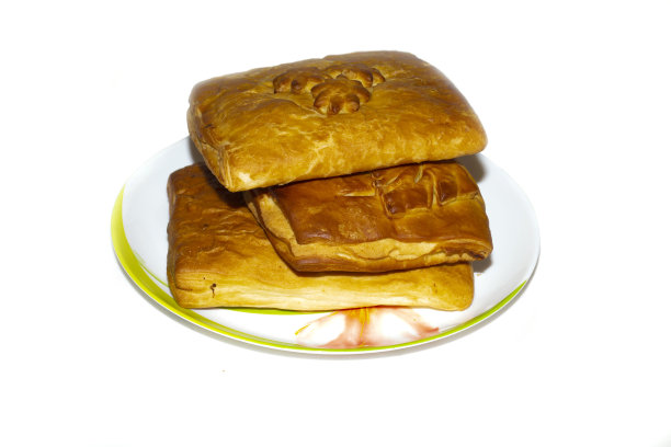 美味的肉馅饼放在盘子里。特写镜头图片下载