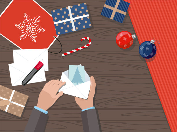 手握明信片圣诞礼物球图片下载