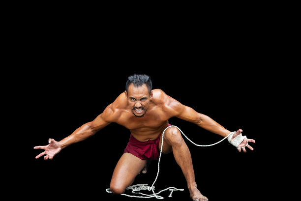 古泰拳，泰拳是一种以黑色为背景的拳击运动图片下载